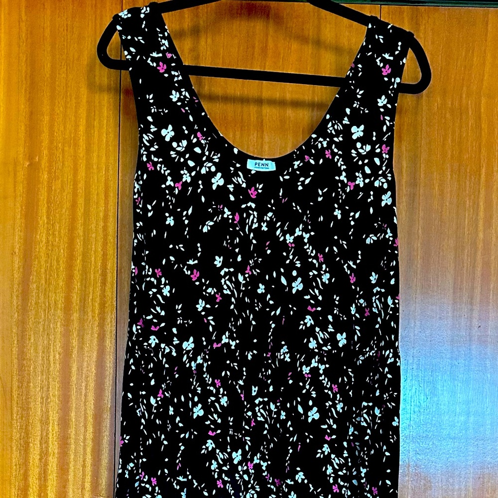 Size X long black w/ flowers dress. Size X. Only worn once.